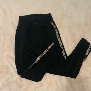 Black and pink gym shark sweatpants